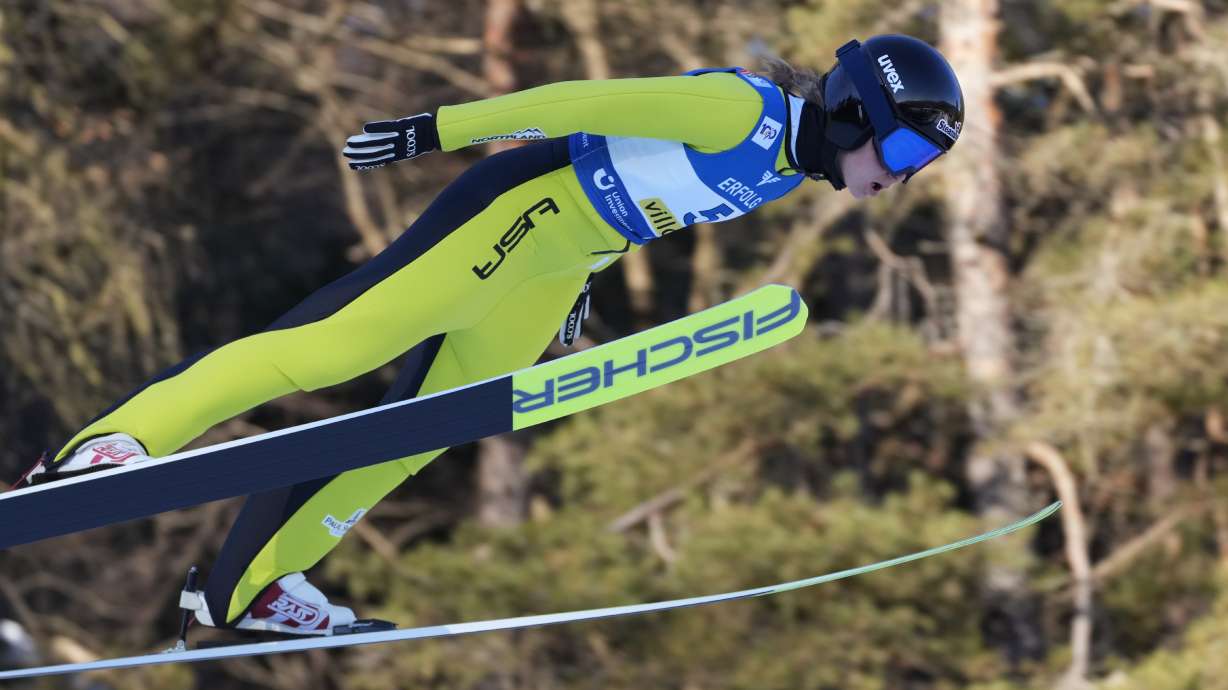 FILE - United States' Annika Belshaw competes at the Women's Normal Hill Individual Ski Jumping World Cup event in Villach, Austria, Jan. 3, 2024.