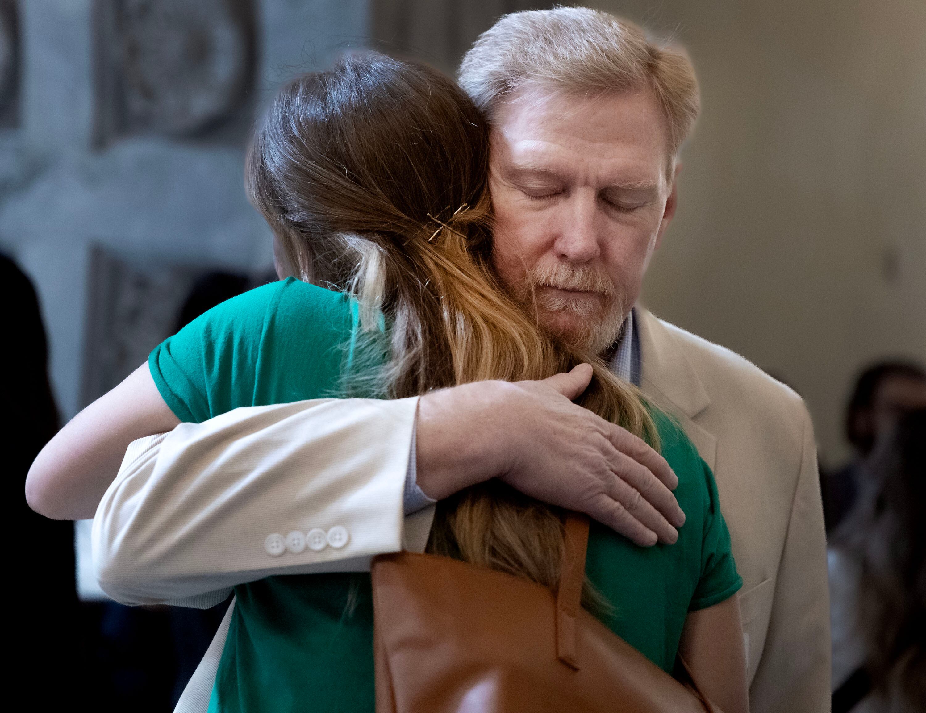 Jeff Worthington, president of the Utah AFL-CIO, comforts Shykell Ledford of the American Federation of State County and Municipal Employees after H.B. 267 “Public Sector Labor Union Amendments” passed through the Senate with a vote of 16-13 at the Capitol in Salt Lake City on Thursday.