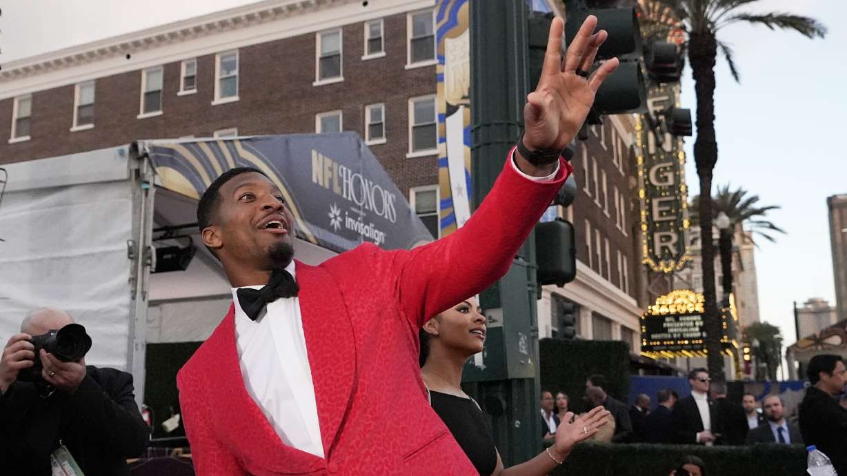 Cleveland Browns quarterback Jameis Winston waves on the red carpet at the NFL Honors award show ahead of the Super Bowl 59 football game, Thursday, Feb. 6, 2025, in New Orleans.