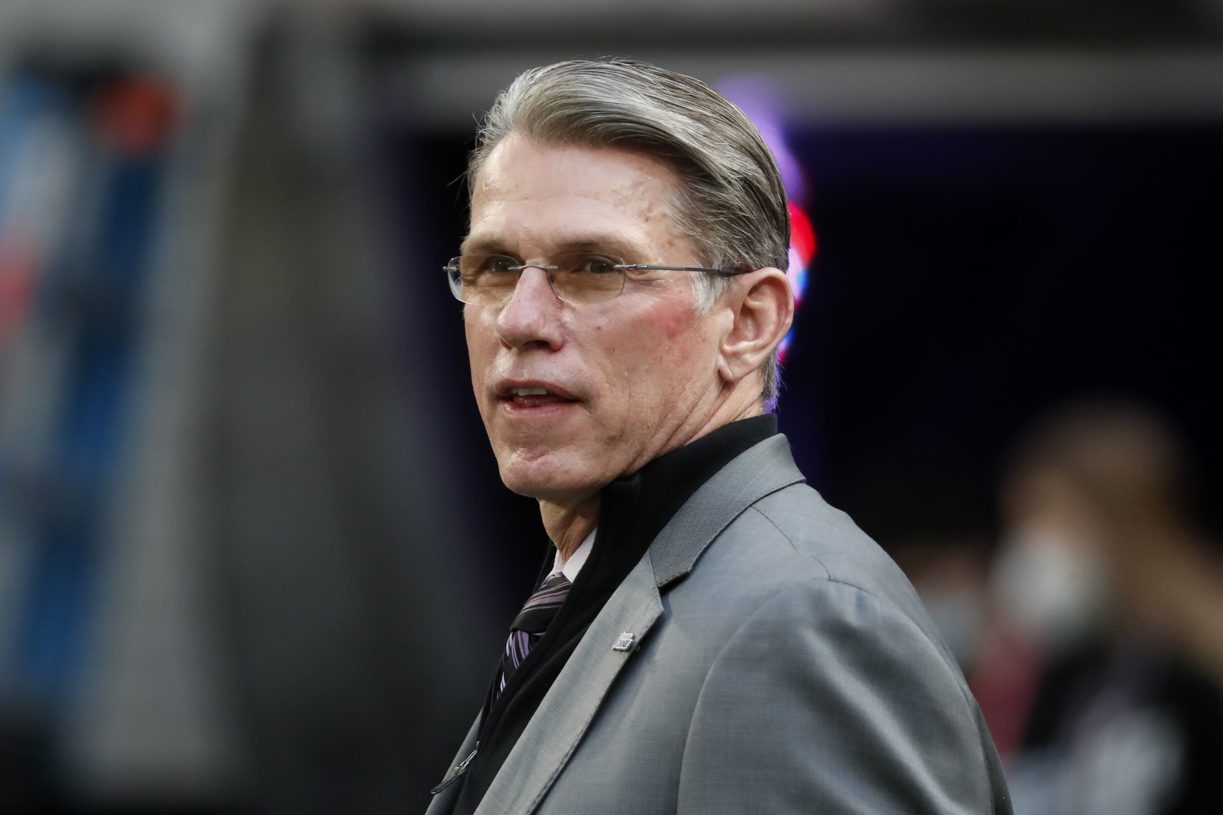 FILE - Minnesota Vikings general manager Rick Spielman stands on the field before an NFL football game against the Chicago Bears, in Minneapolis, Jan. 9, 2022.