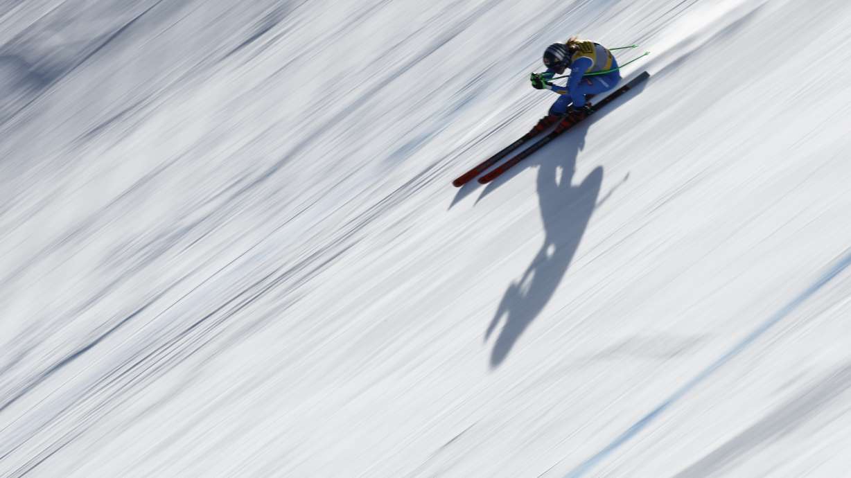 Italy's Sofia Goggia speeds down the course during a women's downhill training, at the Alpine Ski World Championships, in Saalbach-Hinterglemm, Austria, Friday, Feb. 7, 2025.