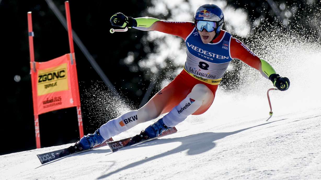 Switzerland's Marco Odermatt speeds down the course during a men's Super-G, at the Alpine Ski World Championships, in Saalbach-Hinterglemm, Austria, Friday, Feb. 7, 2025.