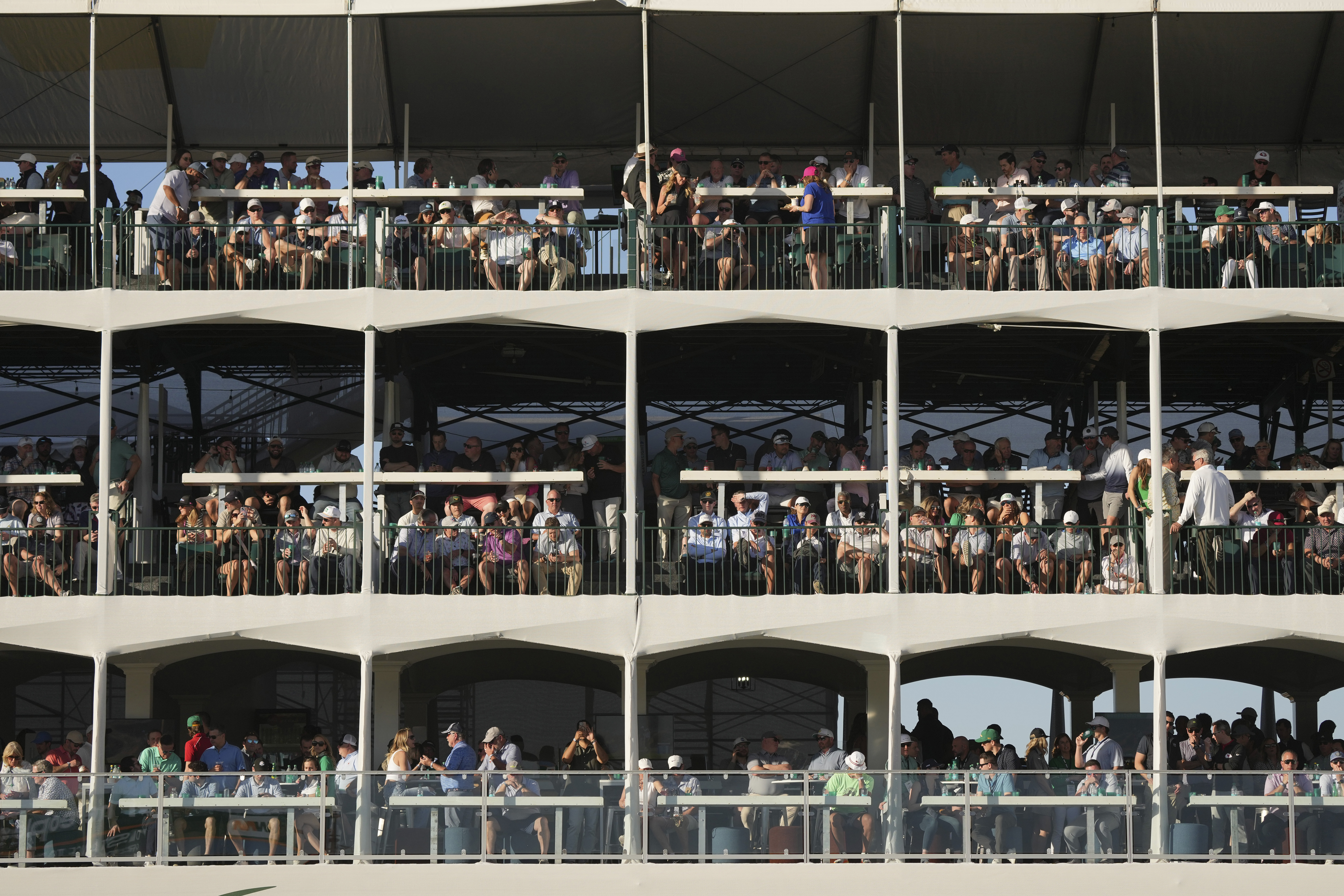 Some of the thousands gathered at the 16th hole during the first round of the Waste Management Phoenix Open PGA Tour golf tournament at the TPC Scottsdale Thursday, Feb. 6, 2025, in Scottsdale, Ariz.