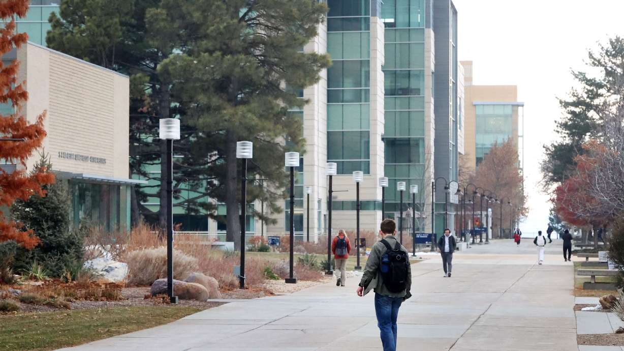 Students walk on the campus of Utah State University in Logan on Jan. 17. Private universities that fail to disclose financial investments in foreign entities could face hefty fines under a new bill introduced by Rep. Burgess Owens, R-Utah, this week.