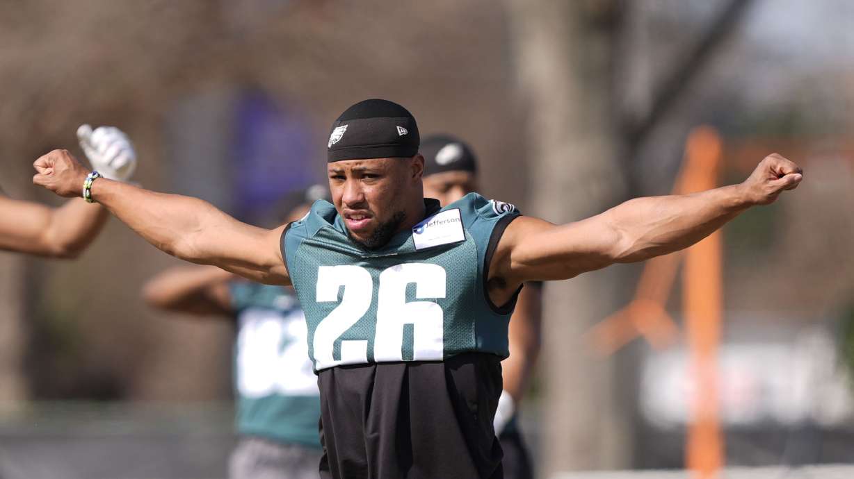 Philadelphia Eagles running back Saquon Barkley (26) warms up during an NFL football practice Wednesday, Feb. 5, 2025, in New Orleans, ahead of Super Bowl 59 against the Kansas City Chiefs.