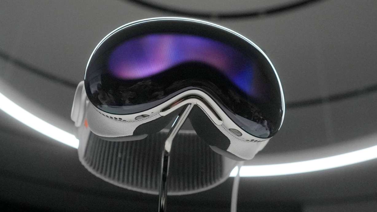 The Apple Vision Pro headset is displayed in a showroom on the Apple campus after its unveiling on June 5, 2023, in Cupertino, Calif. The Vision Pro is a high-priced headset that blends virtual reality with augmented reality.