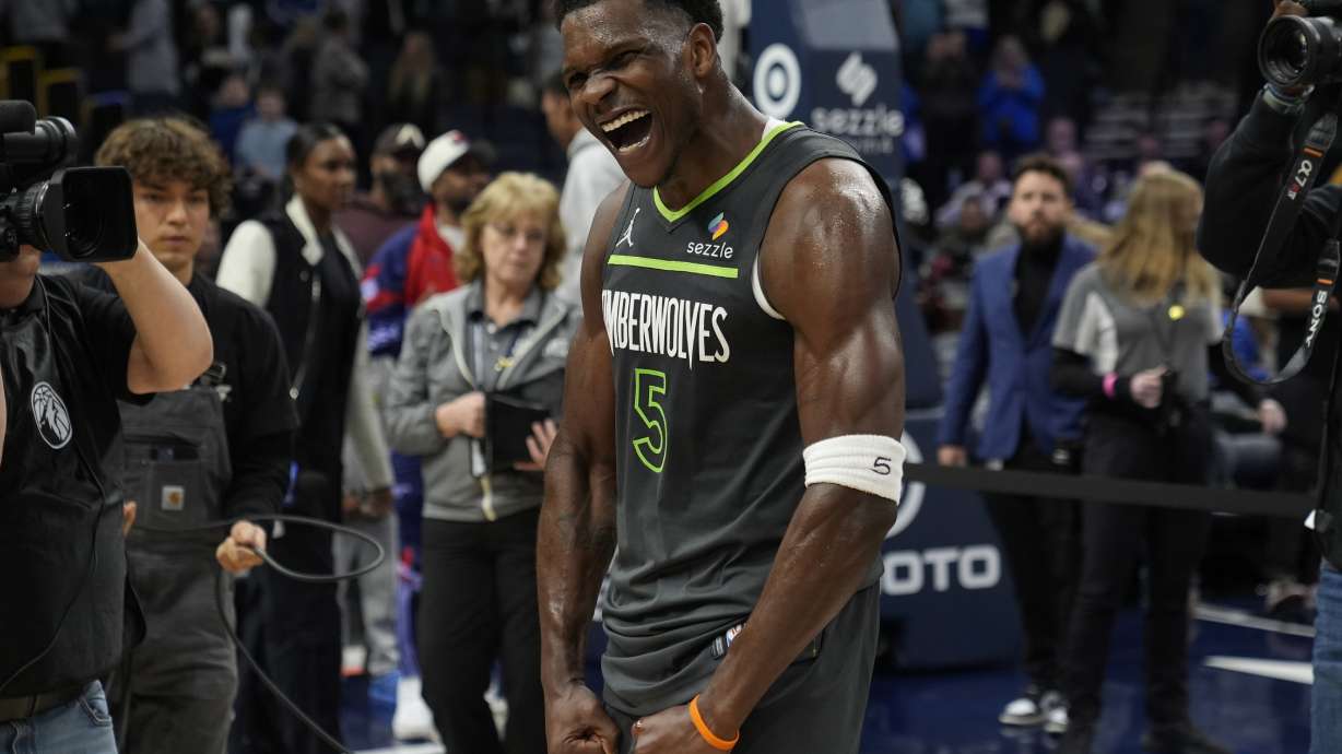 Minnesota Timberwolves guard Anthony Edwards (5) celebrates after an NBA basketball game against the Houston Rockets, Thursday, Feb. 6, 2025, in Minneapolis. Edwards became the youngest player in NBA history to make 1,000 3-point shots.