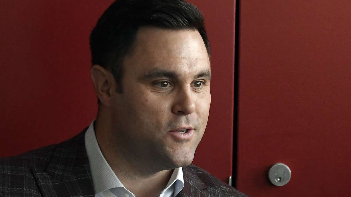 FILE - Massachusetts athletic director Ryan Bamford speaks with themedia before an NCAA college football game between UMass and UConn, Saturday, Oct. 26,, 2019, in Amherst, Mass.