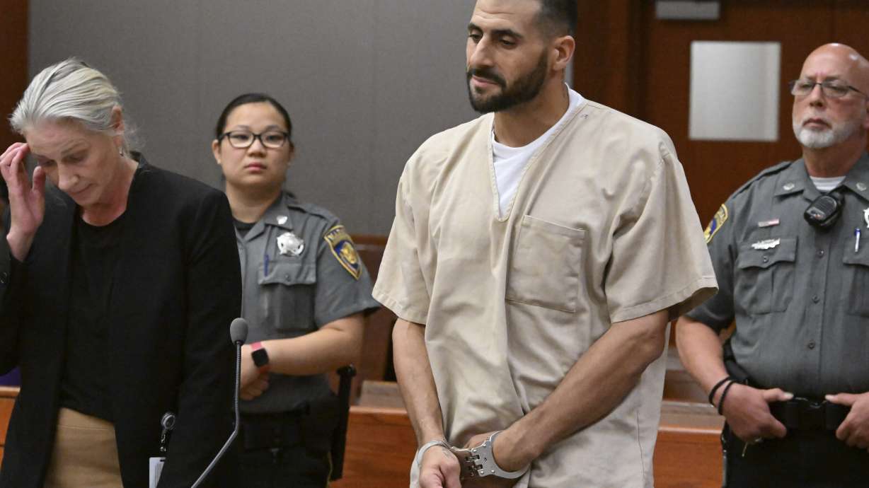 FILE - Dennis Hernandez, the brother of the late New England Patriots tight end Aaron Hernandez, stands with his public defender Sandra Crowell during his arraignment, Aug. 1, 2023, at Connecticut Superior Court in New Britain, Conn.