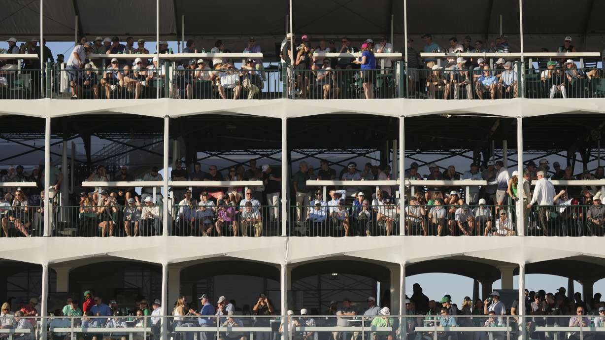 Some of the thousands gathered at the 16th hole during the first round of the Waste Management Phoenix Open PGA Tour golf tournament at the TPC Scottsdale Thursday, Feb. 6, 2025, in Scottsdale, Ariz.