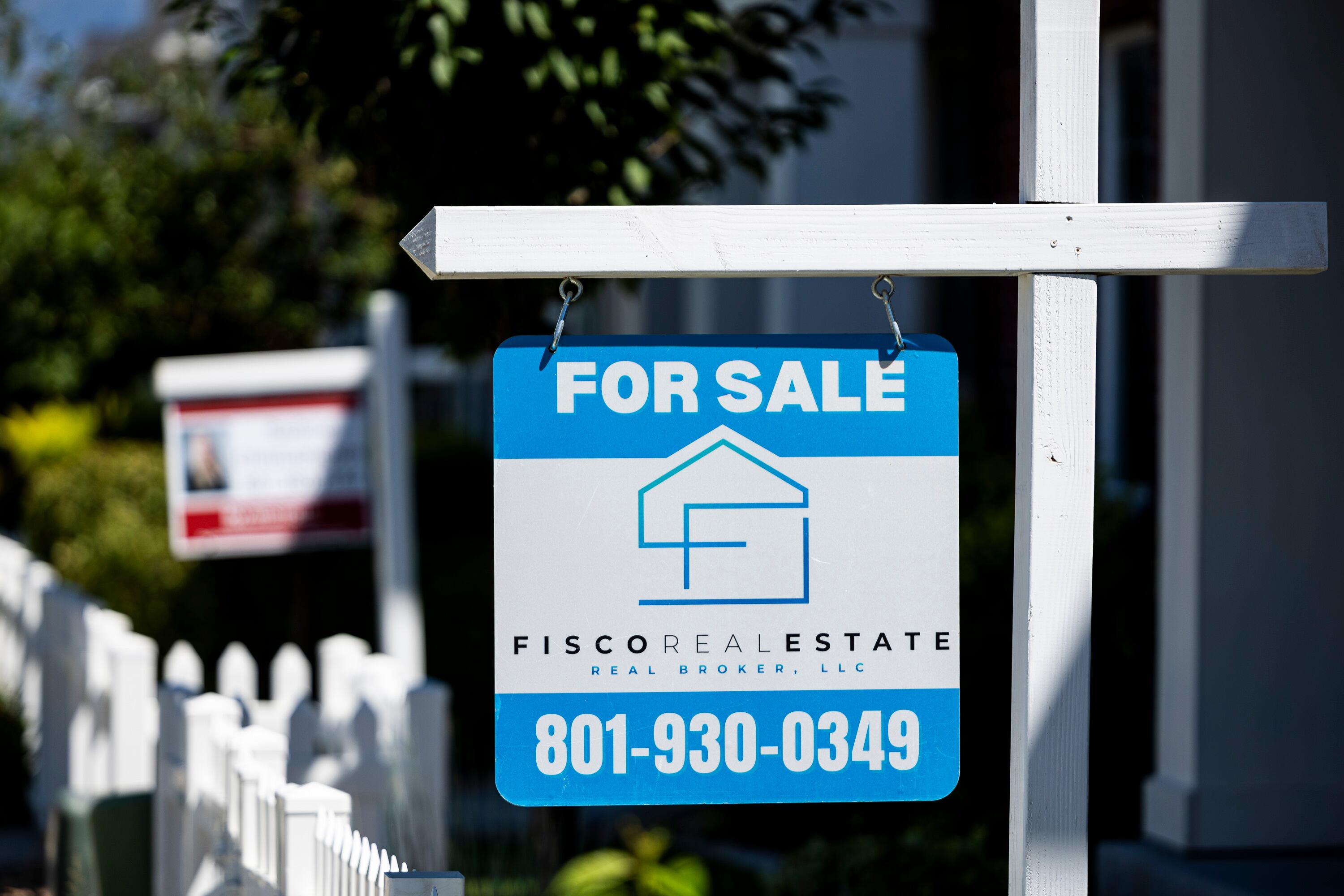 A for-sale sign is displayed outside a townhome in Lehi on Aug. 13, 2024. Mortgage rates fell slightly last week, but some experts warn there’s uncertainty ahead.