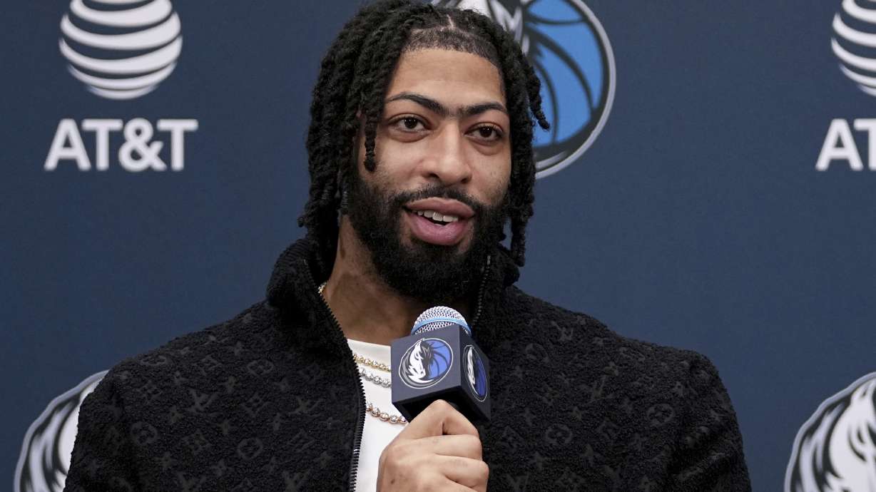 Newly acquired Dallas Mavericks players Anthony Davis responds to a question during a news conference at the NBA basketball team's practice facility in Dallas, Friday, Feb. 7, 2025.