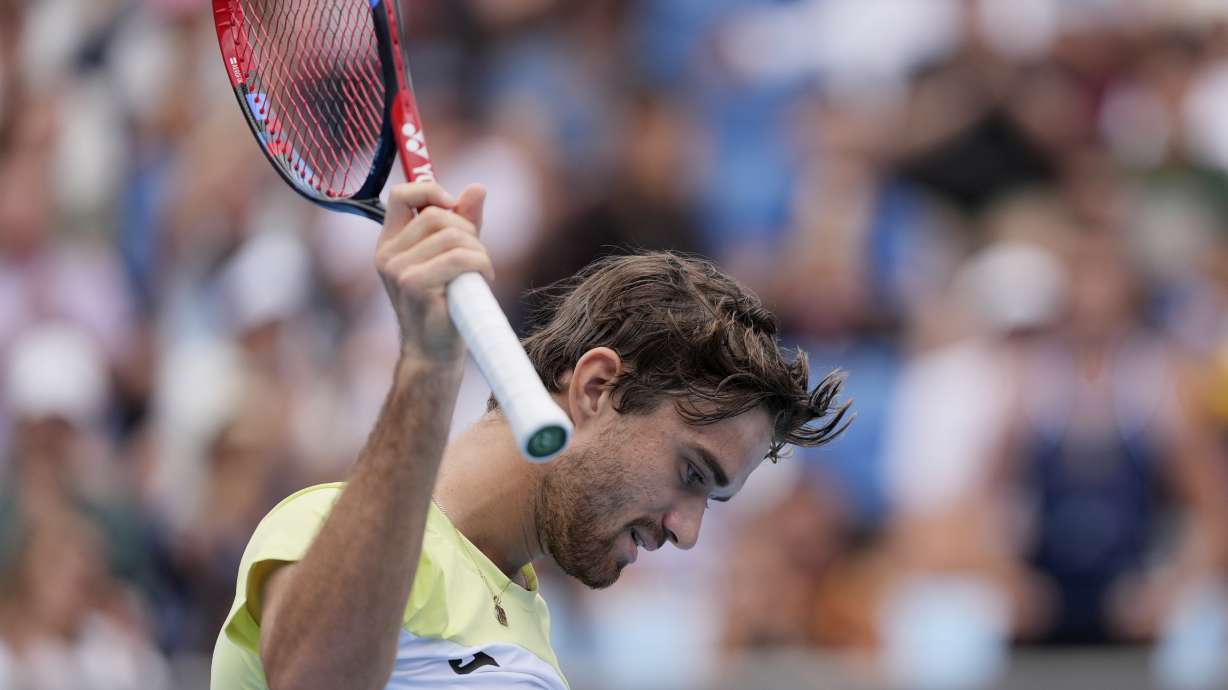 Tomas Machac of the Czech Republic celebrates after defeating Reilly Opelka of the U.S. in their second round match at the Australian Open tennis championship in Melbourne, Australia, Wednesday, Jan. 15, 2025.