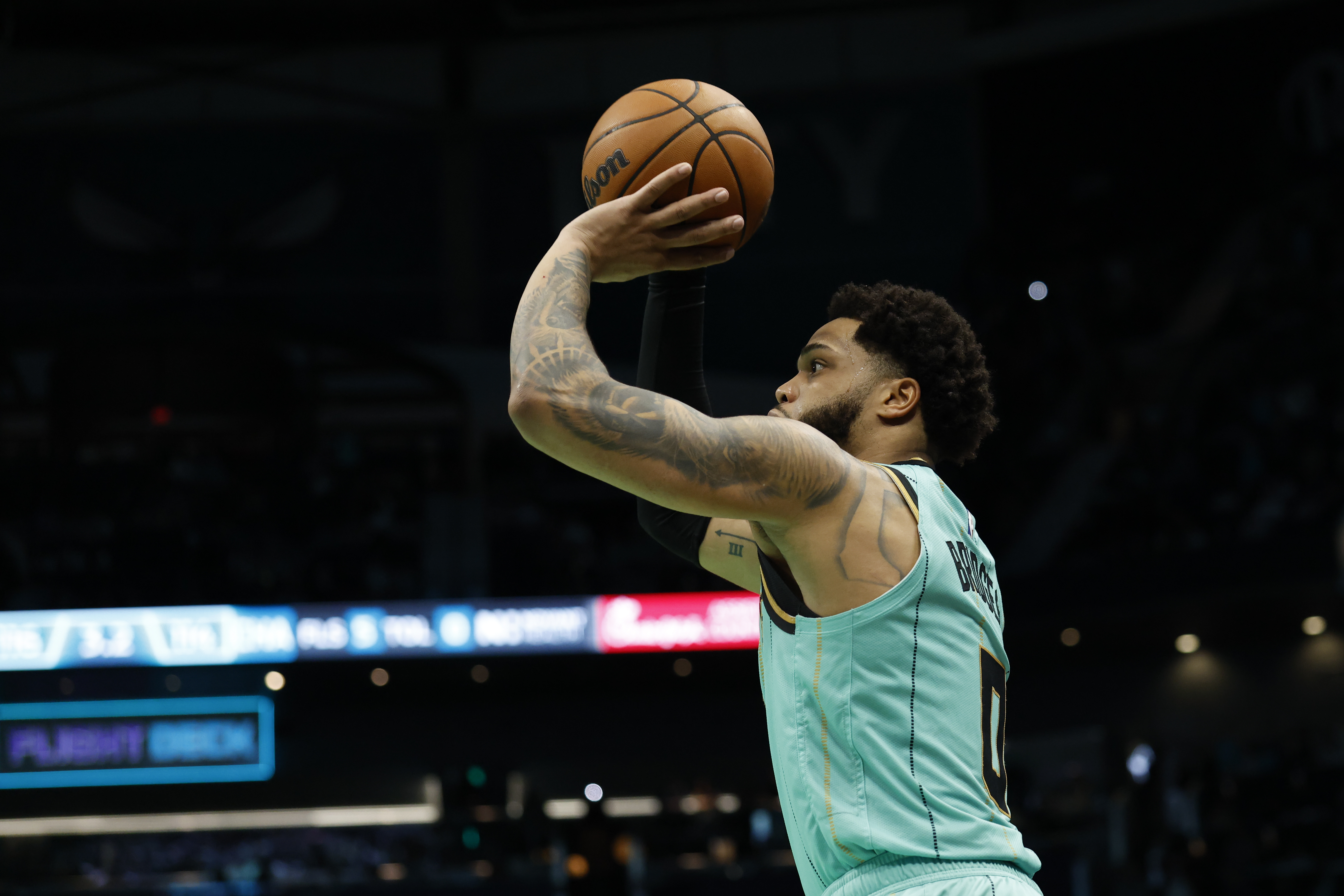 Charlotte Hornets forward Miles Bridges prepares to shoot the winning 3-point basket during the second half of an NBA basketball game against the San Antonio Spurs in Charlotte, N.C., Friday, Feb. 7, 2025.