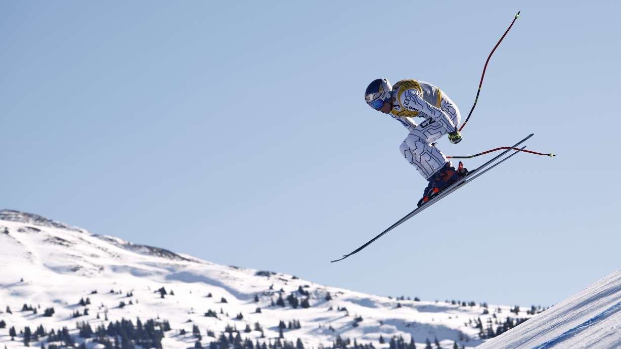 Czech Republic's Ester Ledecka is airborne during a women's downhill race, at the Alpine Ski World Championships, in Saalbach-Hinterglemm, Austria, Saturday, Feb. 8, 2025.