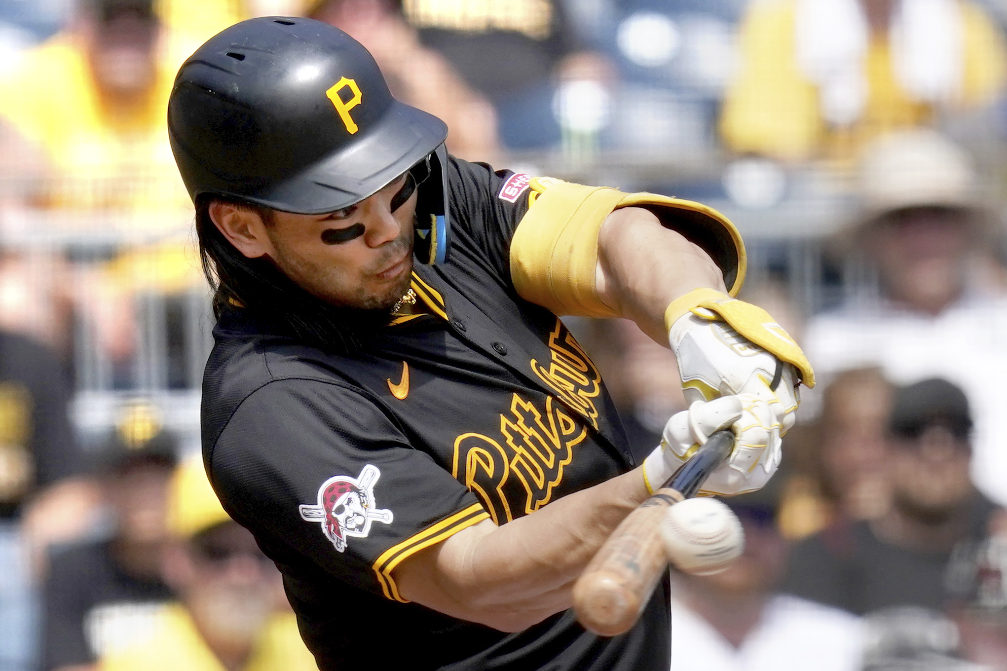 FILE - Pittsburgh Pirates' Connor Joe hits a single during the second inning of a baseball game against the Chicago Cubs, in Pittsburgh, Aug. 28, 2024.