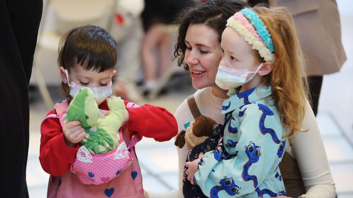 Angela Matthes plays with her children Ehrhardt and Ilse in the rotunda at the Capitol in Salt Lake City on Jan. 27, 2023. Parents, children, educators and supporters gathered at the Capitol for Child Care Day on the Hill.