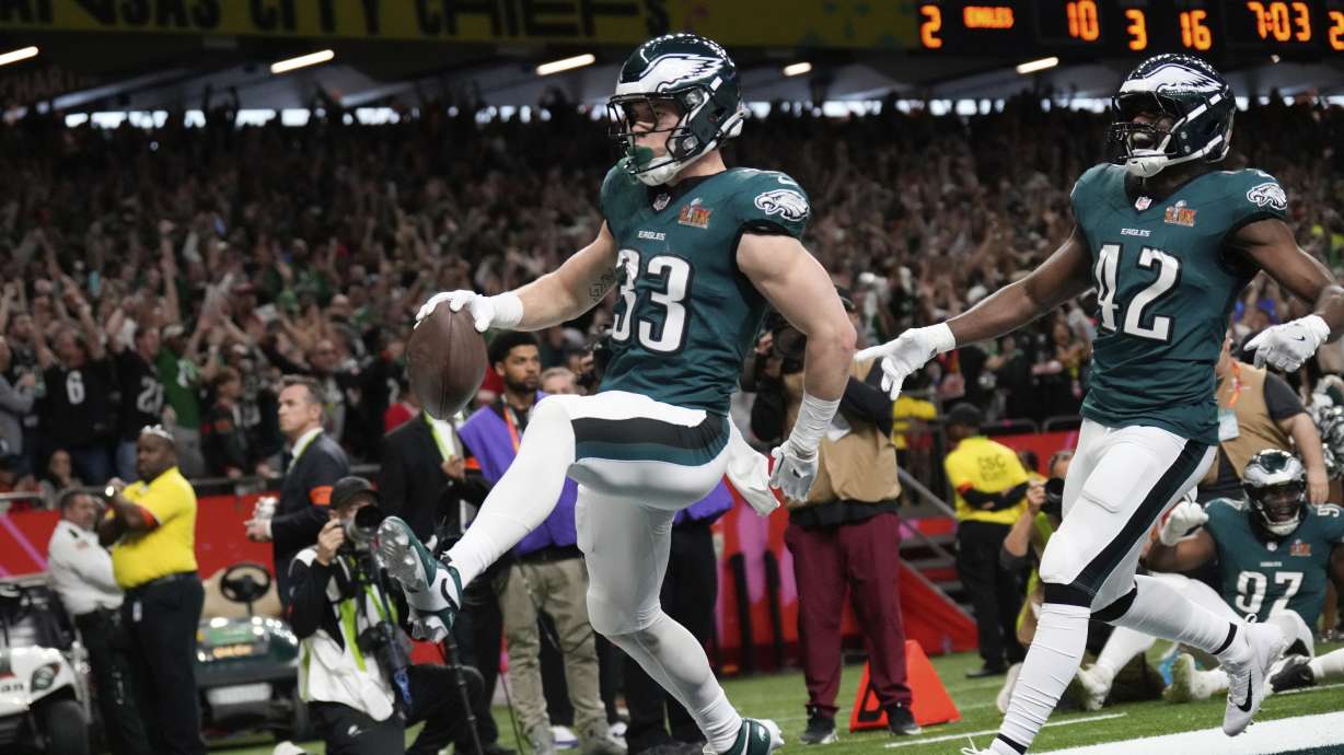 Philadelphia Eagles defensive back Cooper DeJean (33) scores a touchdown after intercepting a pass during the first half of the NFL Super Bowl 59 football game against the Kansas City Chiefs, Sunday, Feb. 9, 2025, in New Orleans.