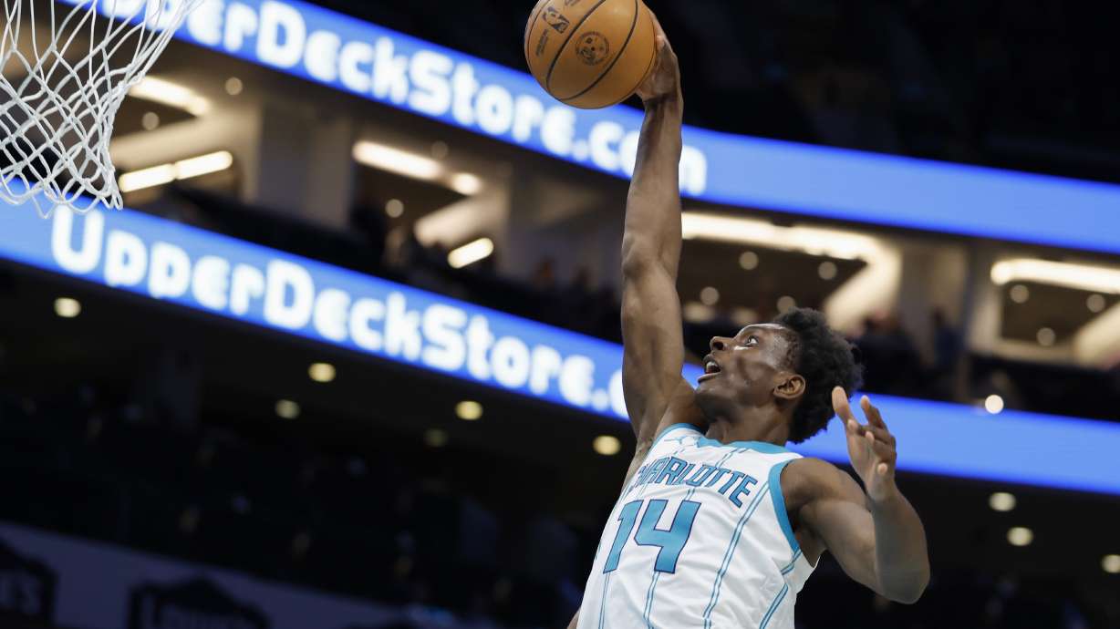 Charlotte Hornets forward Moussa Diabate (14) drives to the basket during the first half of an NBA basketball game against the Milwaukee Bucks in Charlotte, N.C., Wednesday, Feb. 5, 2025.