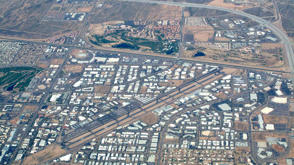 The Scottsdale Airport is seen in Scottsdale, Ariz. in 2004. At least one person was killed after two business jets collided on the runway at Scottsdale airport.