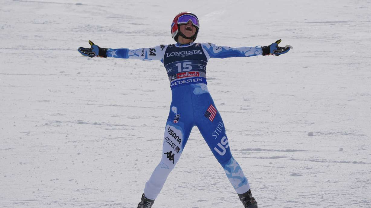 United States' Lauren Macuga celebrates at the finish area of a downhill run of a women's team combined event, at the Alpine Ski World Championships, in Saalbach-Hinterglemm, Austria, Tuesday, Feb. 11, 2025.