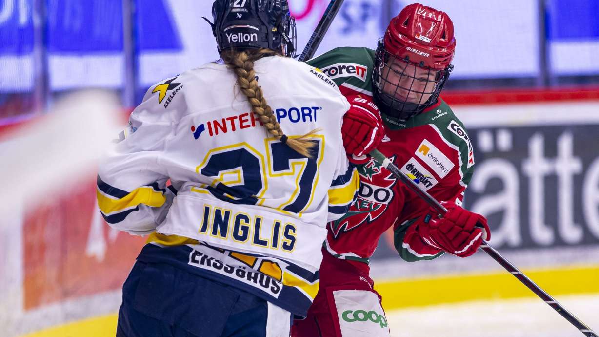 HV71's Teghan Inglis, left, challenges Modo's Alexie Guay during their Swedish Women's hockey league match in Örnsköldsvik, Sweden, on Jan. 10, 2025.