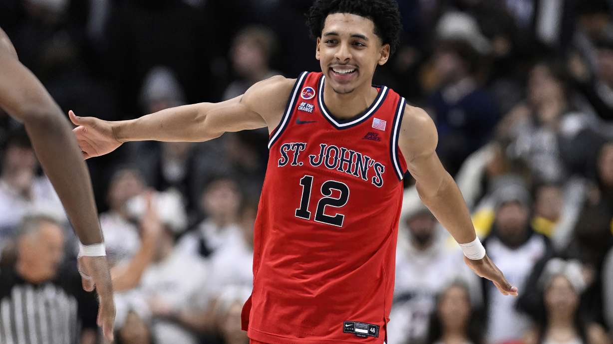 St. John's guard RJ Luis Jr. (12) celebrates at the end of an NCAA college basketball game against UConn, Friday, Feb. 7, 2025, in Storrs, Conn.