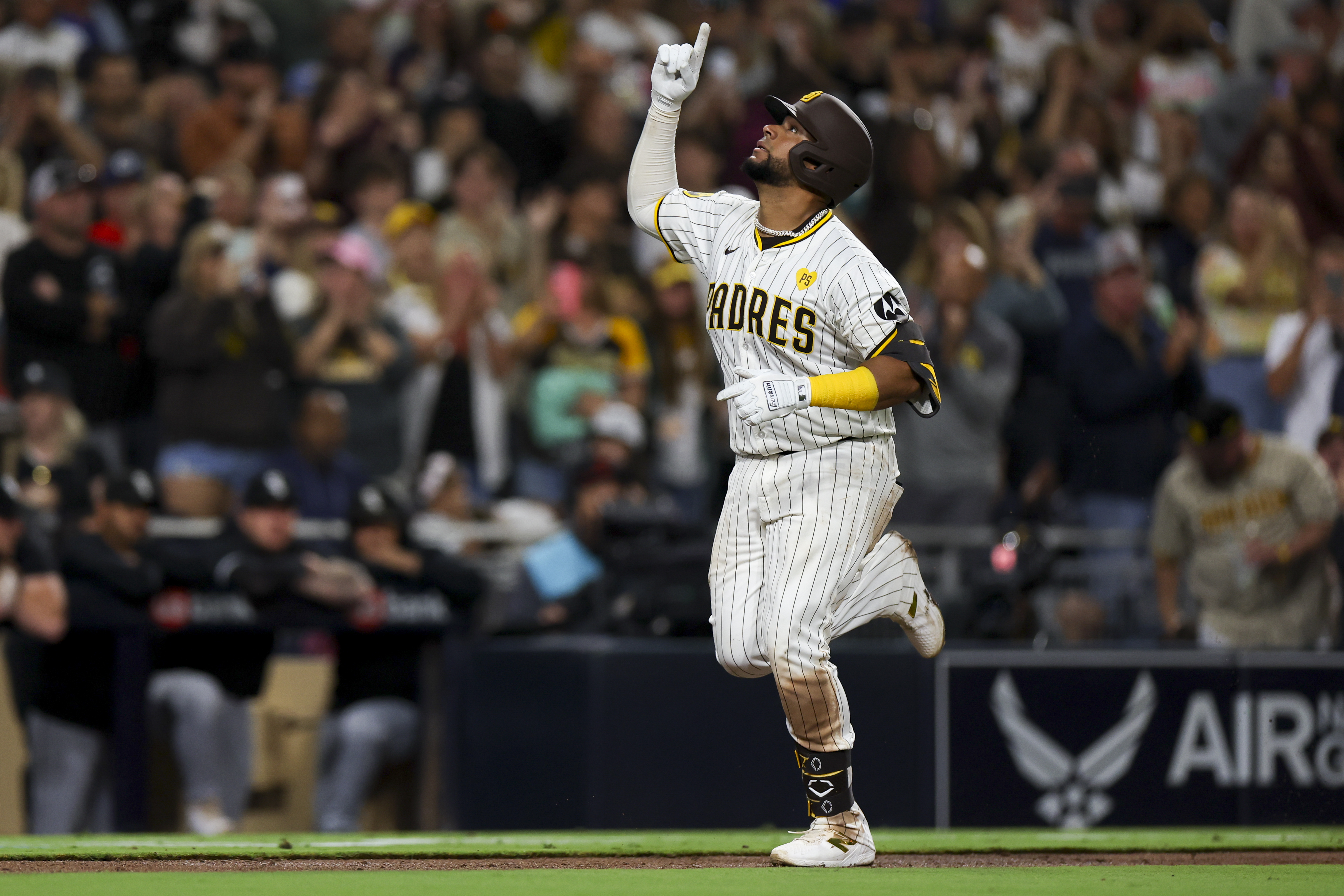 FILE - San Diego Padres' Elias Diaz celebrates after hitting a two-run home run during the eighth inning of a baseball game against the Chicago White Sox, Saturday, Sept. 21, 2024, in San Diego.