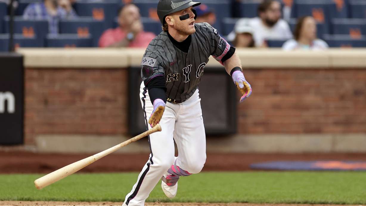 FILE - New York Mets' Harrison Bader hits a home run during the sixth inning of a baseball game against the Cincinnati Reds, Saturday, Sept. 7, 2024, in New York.