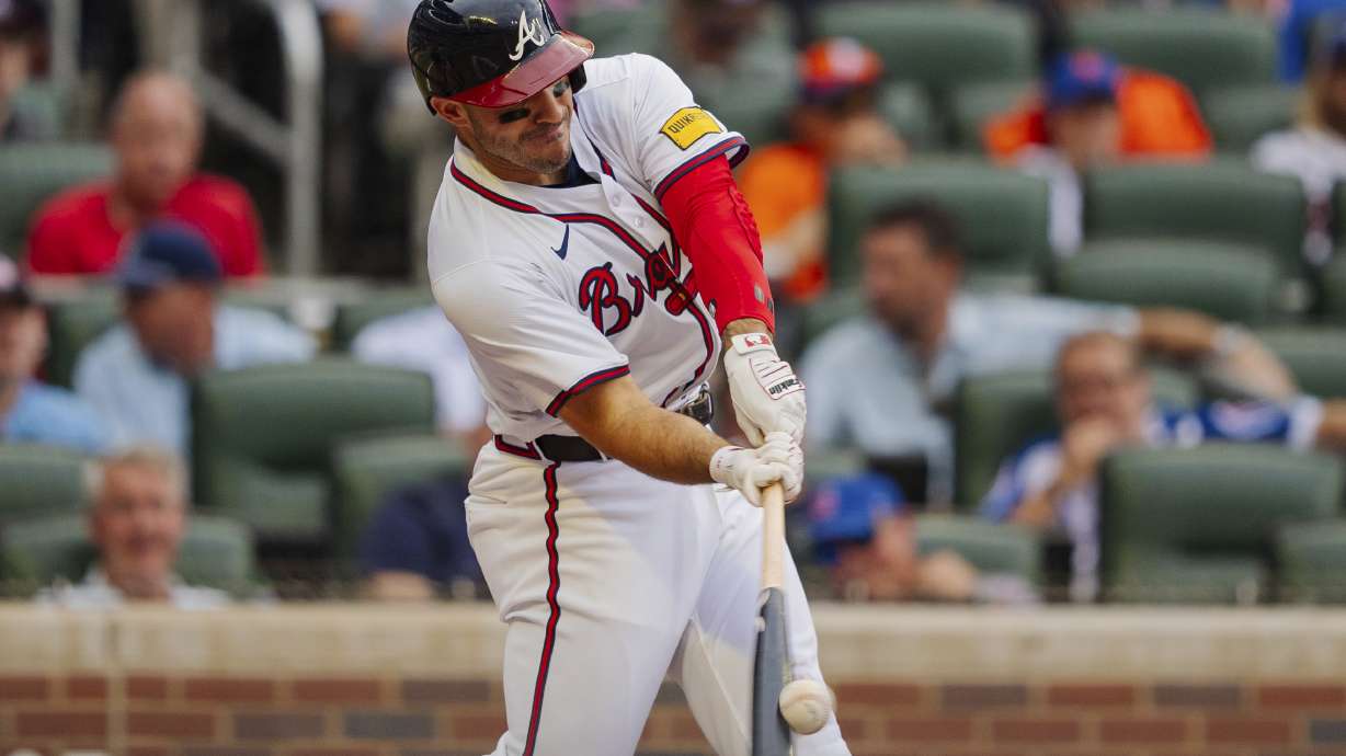 FILE - Atlanta Braves' Ramon Laureano hits a home run to center field in the sixth inning of a baseball game against the New York Mets, Monday, Sept. 30, 2024, in Atlanta.