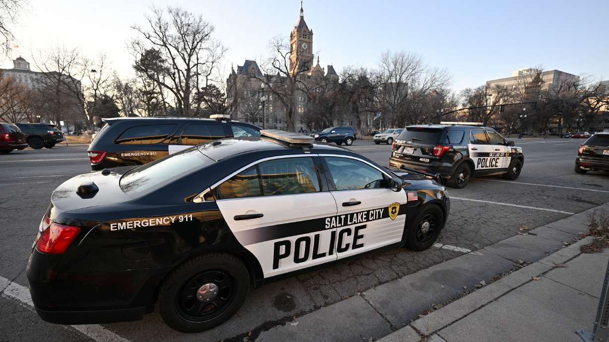 Salt Lake City police cars sit outside The Leonardo on Jan. 28. Arrests and citations are up "significantly" in Salt Lake City so far in 2025, the capital city's chief of police told state lawmakers on Wednesday.
