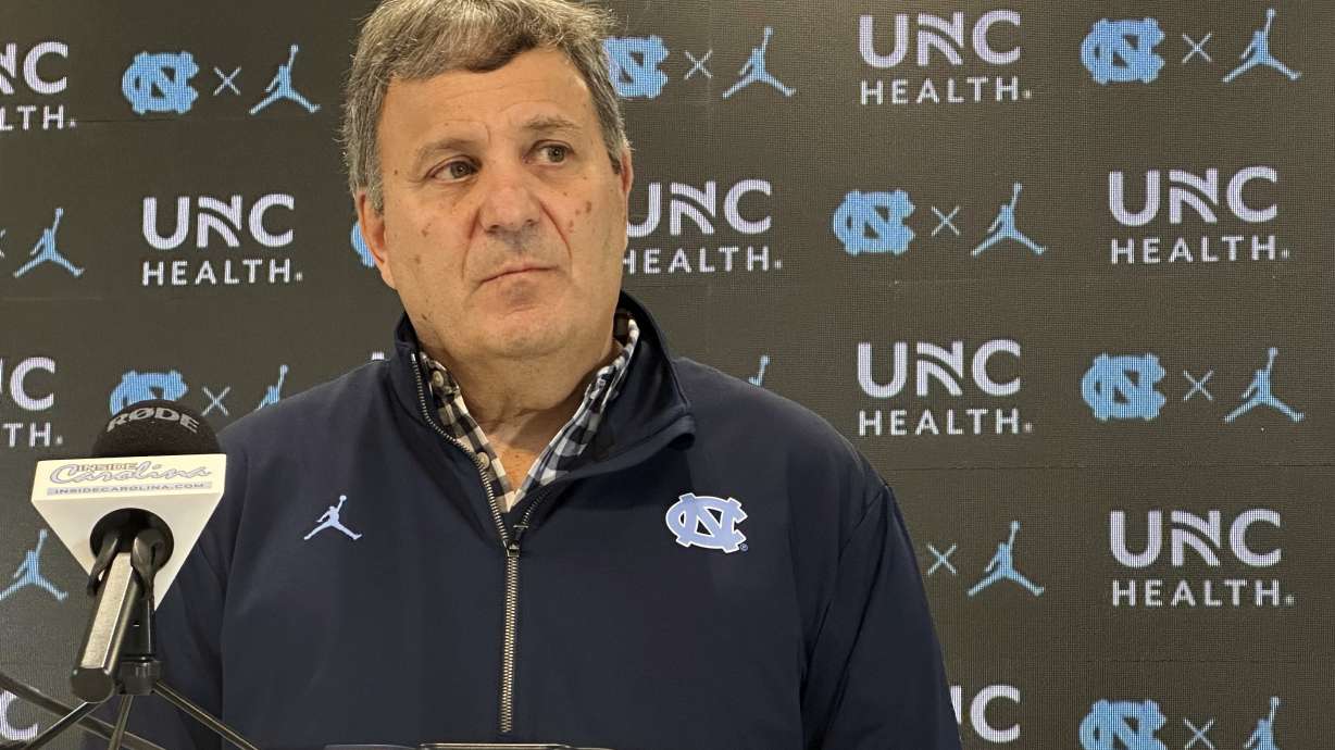 North Carolina general manager Michael Lombardi speaks with reporters during an NCAA college football news conference, Tuesday, Feb. 11, 2025, in Chapel Hill, N.C., about two months after the hiring of football coach Bill Belichick,