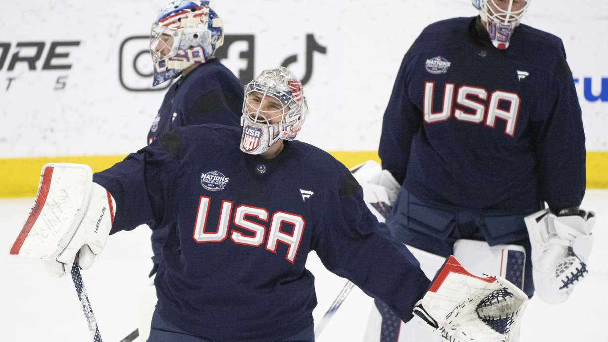 U.S. goaltenders Connor Hellebuyck, centre, Jeremy Swayman, left, and Jake Oettinger on the ice during 4 Nations Face-Off hockey practice in Brossard, Que., on Monday, Feb. 10, 2025.
