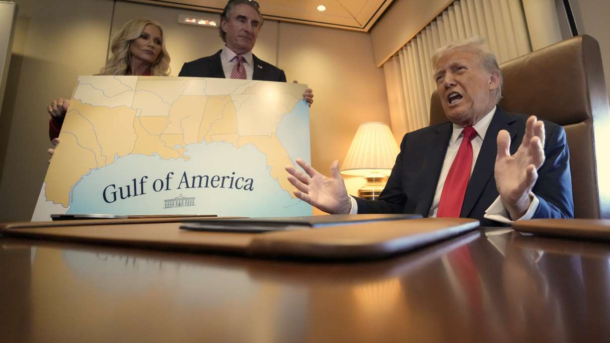 President Donald Trump aboard Air Force One where he signed a proclamation declaring Feb. 9 Gulf of America Day, as he travels from West Palm Beach, Fla. to New Orleans, Sunday.