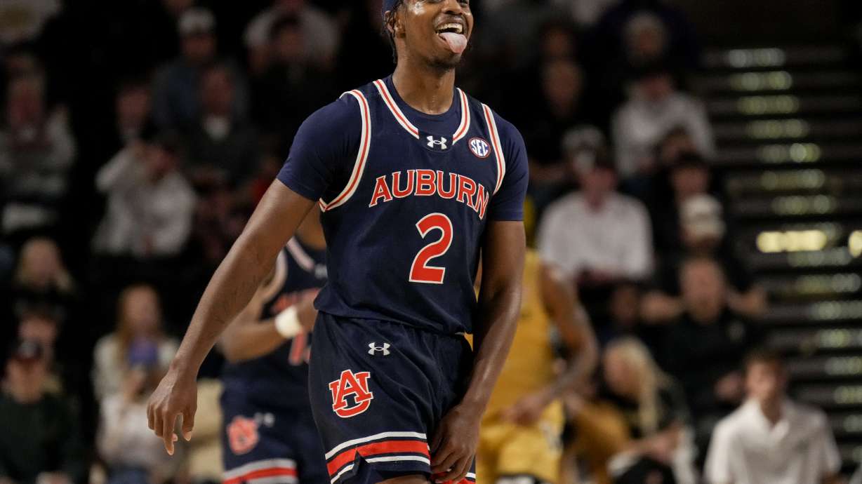 Auburn guard Denver Jones (2) celebrates during the first half of an NCAA college basketball game against Vanderbilt, Tuesday, Feb. 11, 2025, in Nashville, Tenn.
