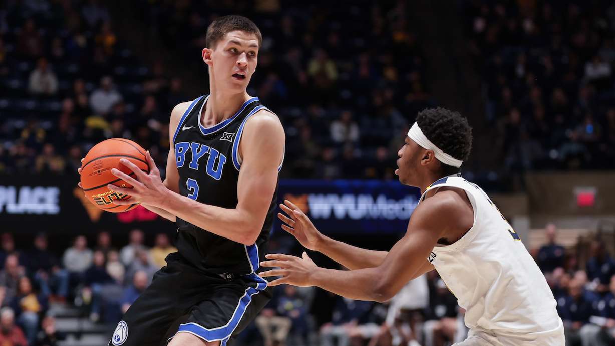 BYU's Egor Demin looks to pass during the Cougars' 73-69 win over the Mountaineers in a Big 12 men's basketball game, Tuesday, Feb. 11, 2025 at WVU Coliseum in Morgantown, W.Va.