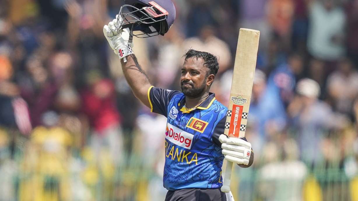 Sri Lanka's Captain Charith Asalanka celebrates his century during the first ODI cricket match between Sri Lanka and Australia in Colombo, Sri Lanka, Wednesday, Feb. 12, 2025.