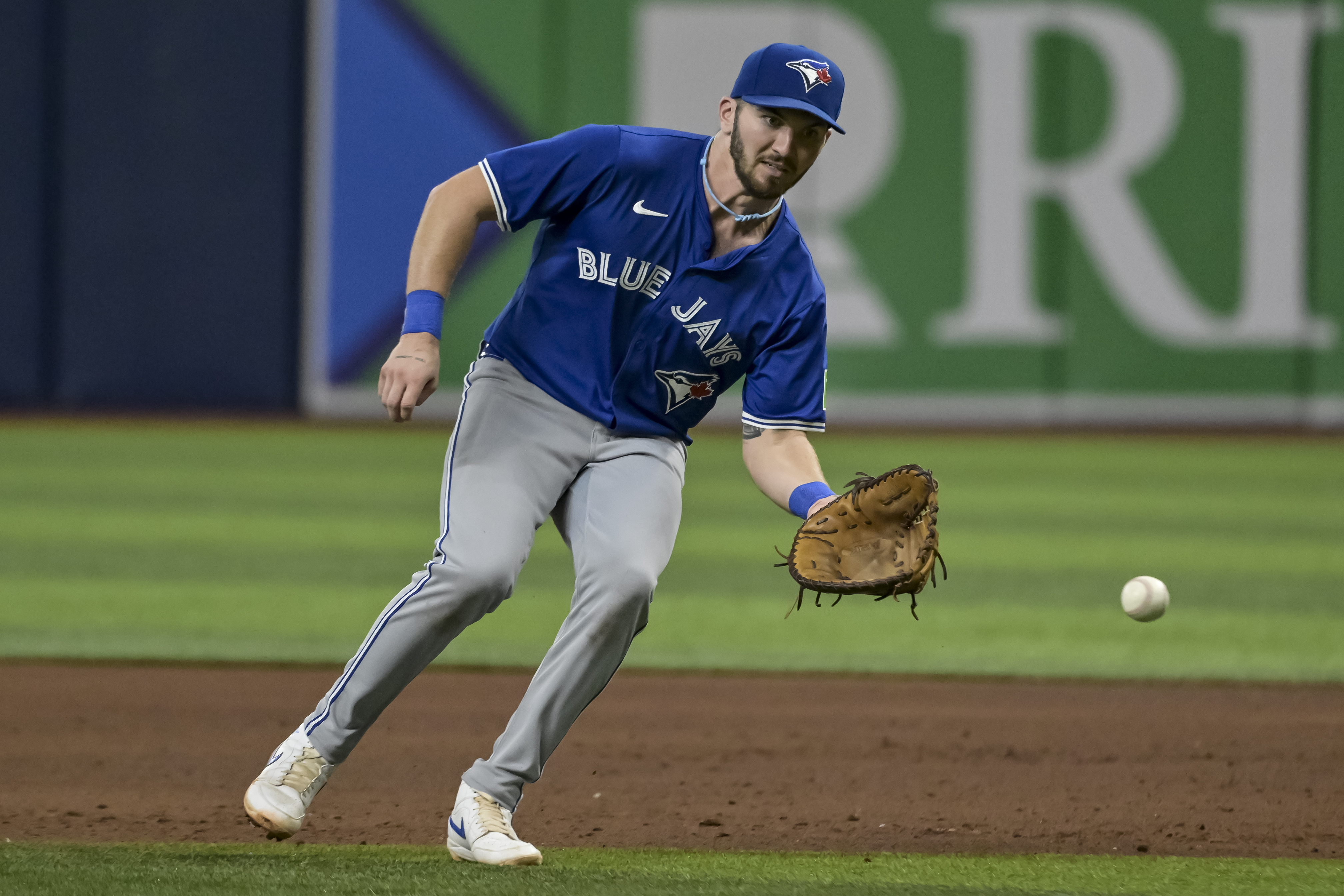 FILE - Toronto Blue Jays first baseman Spencer Horwitz reaches for an infield grounder during a baseball game against the Tampa Bay Rays Saturday, Sept. 21, 2024, in St. Petersburg, Fla.