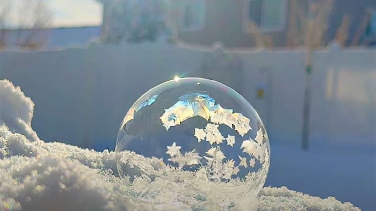 A Colorado family's frozen soap bubbles showcase stunning ice crystals.