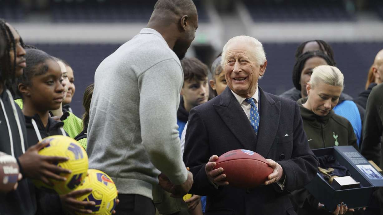 Britain's King Charles III visits Tottenham Hotspur Stadium, north London, to celebrate the positive charitable work being done within the local community, in partnership with Tottenham Hotspur F.C. and the National Football League (NFL), on Wednesday Feb. 12, 2025.