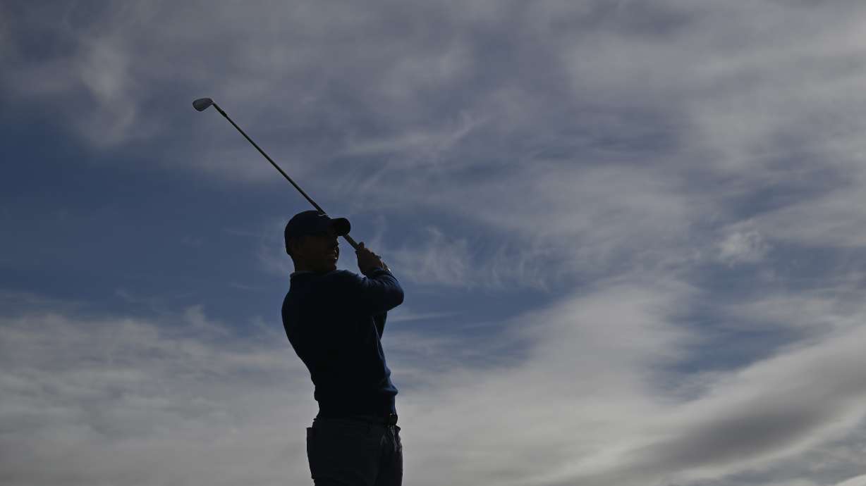 Rory McIlroy, of Northern Ireland, hits from the 18th tee at Pebble Beach Golf Links during the final round of the AT&T Pebble Beach Pro-Am golf tournament, Sunday, Feb. 2, 2025, in Pebble Beach, Calif.