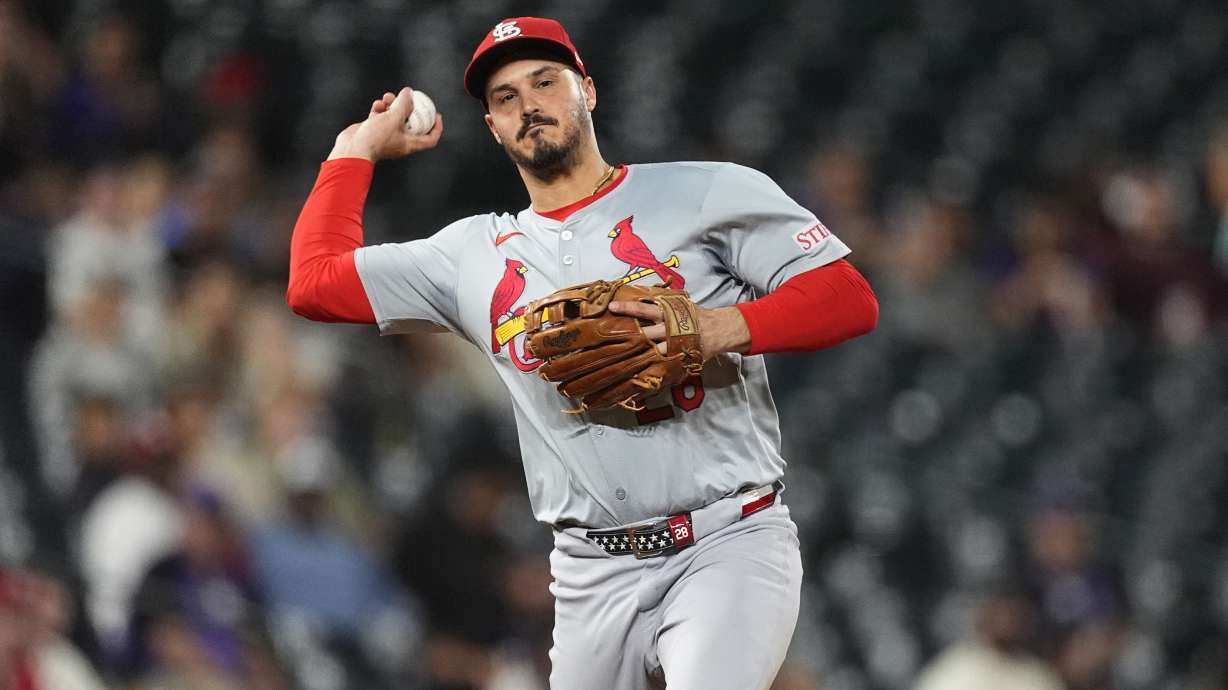 FILE - St. Louis Cardinals third baseman Nolan Arenado throws to first base in the ninth inning of a baseball game Sept. 25, 2024, in Denver.