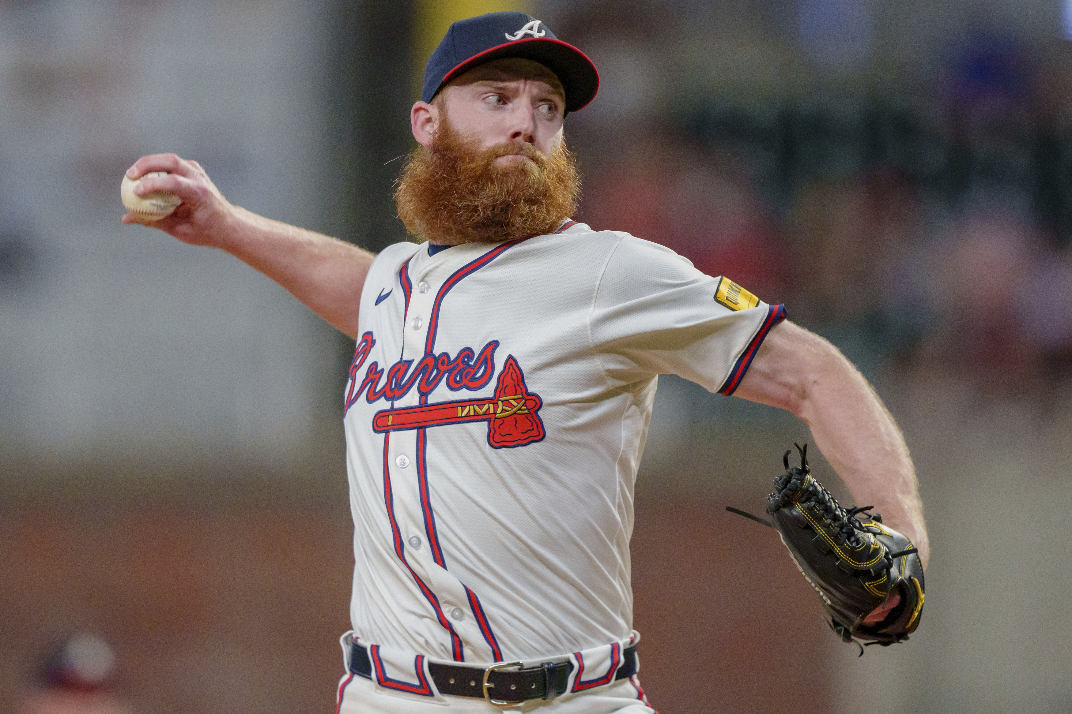 FILE - Atlanta Braves pitcher John Brebbia throws in the ninth inning of a baseball game against the Colorado Rockies, Sept. 5, 2024, in Atlanta.