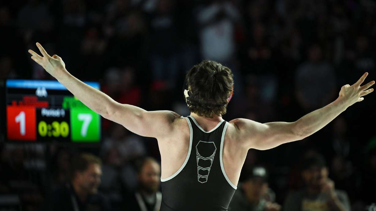 Uintah’s Michael Alexander celebrates his win over Stansbury’s Benjamin Ploehn in the 126 lb championship match as wrestlers compete in the state championships at UVU in Orem on Wednesday February 12, 2025.