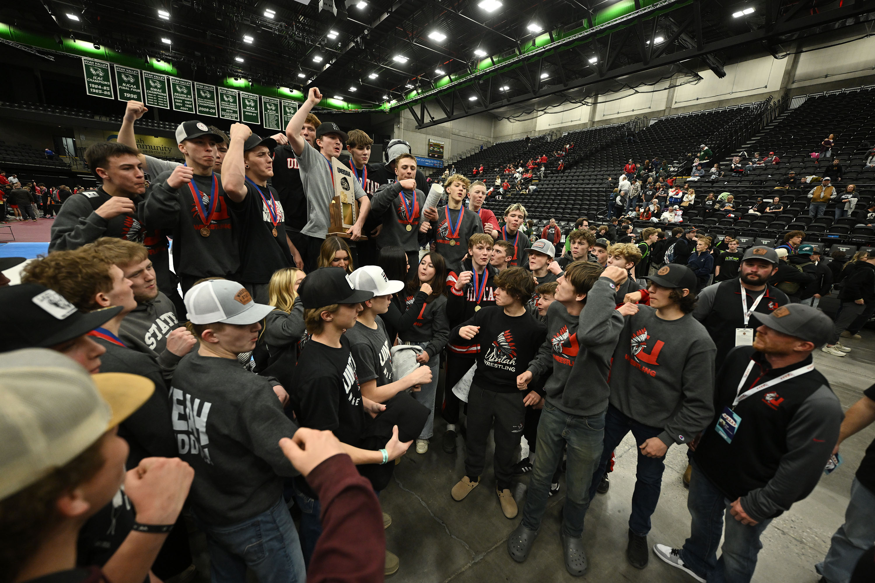 Uintah celebrates their 5th straight championship as wrestlers compete in the state championships at UVU in Orem on Wednesday February 12, 2025.