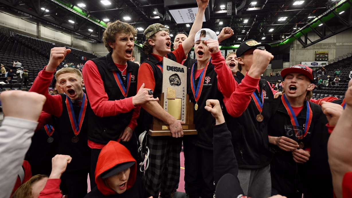 Spanish Fork celebrates their 2nd straight championship as wrestlers compete in the state championships at UVU in Orem on Wednesday February 12, 2025.