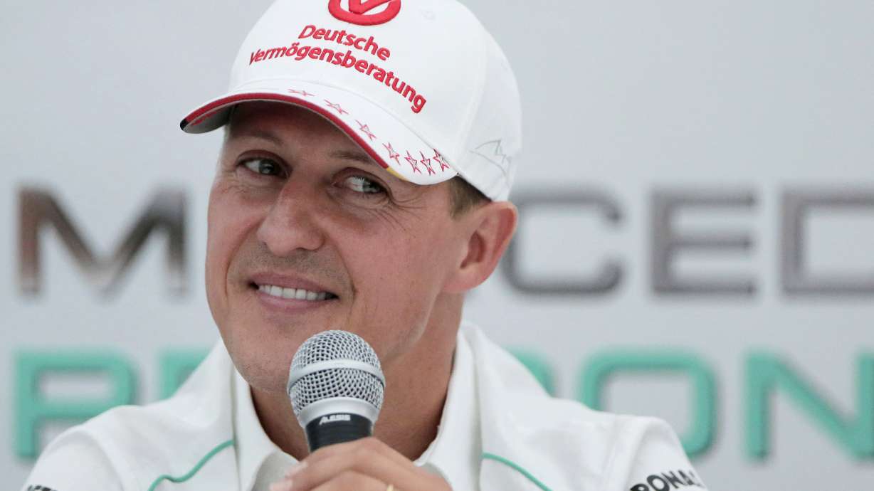 FILE - Michael Schumacher announces his retirement from Formula One during a press conference at the Suzuka Circuit venue for the Japanese Formula One Grand Prix in Suzuka, Japan, Oct. 4, 2012.