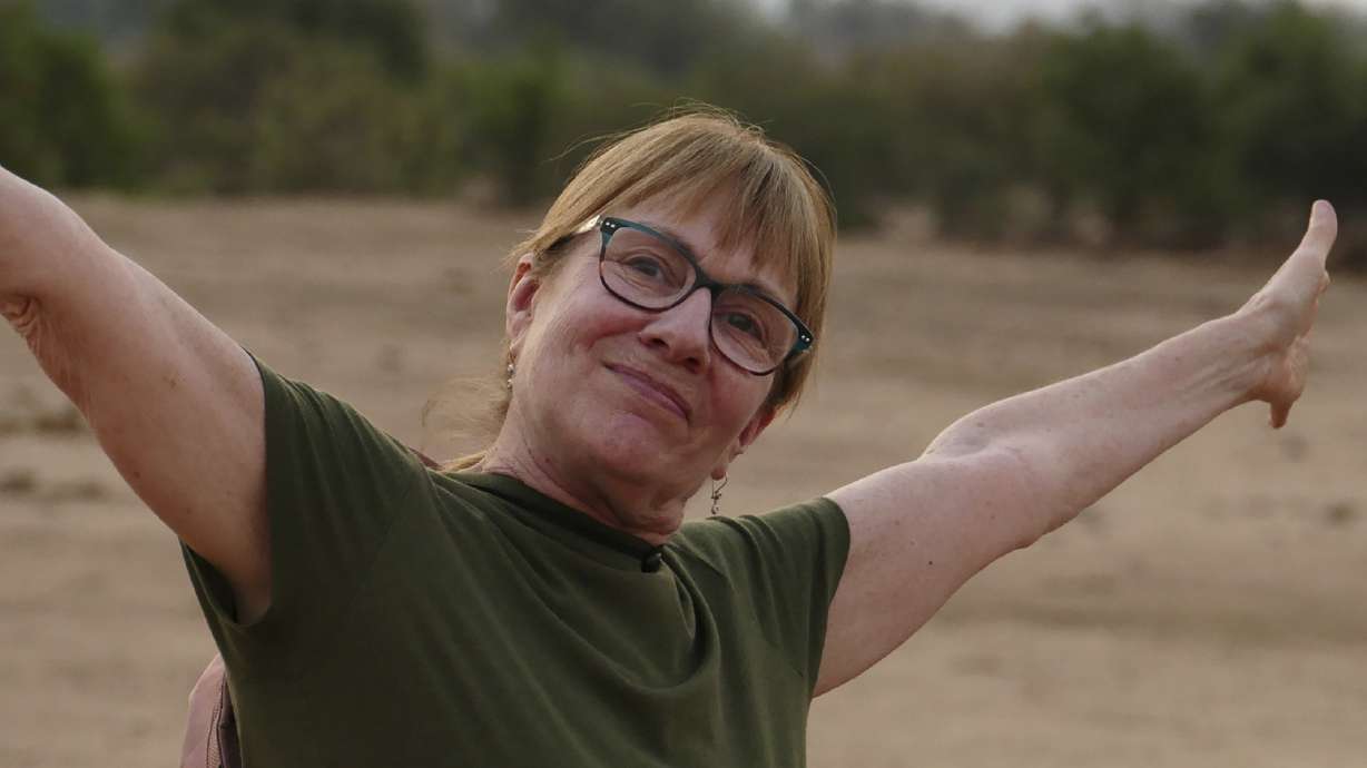 This photo provided by Craig Manders shows his wife Lisa Manders in Zambia in mid-2024. Lisa Manders was killed in a hippopotamus attack during this trip while on a safari with her husband and died on June 5.