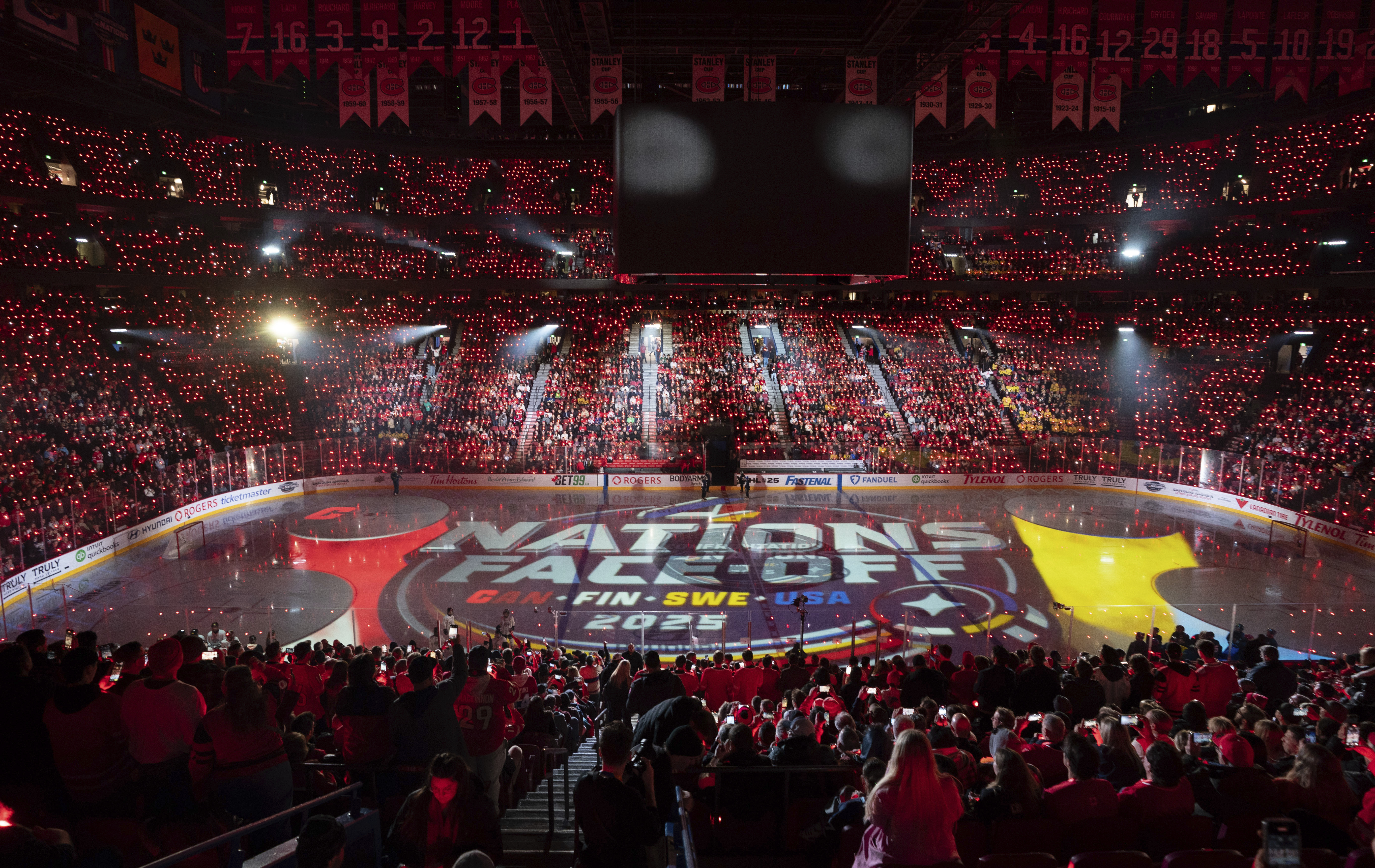 People cheer prior to the 4 Nations Face-Off hockey game between Canada and Sweden in Montreal, Wednesday, Feb. 12, 2025.