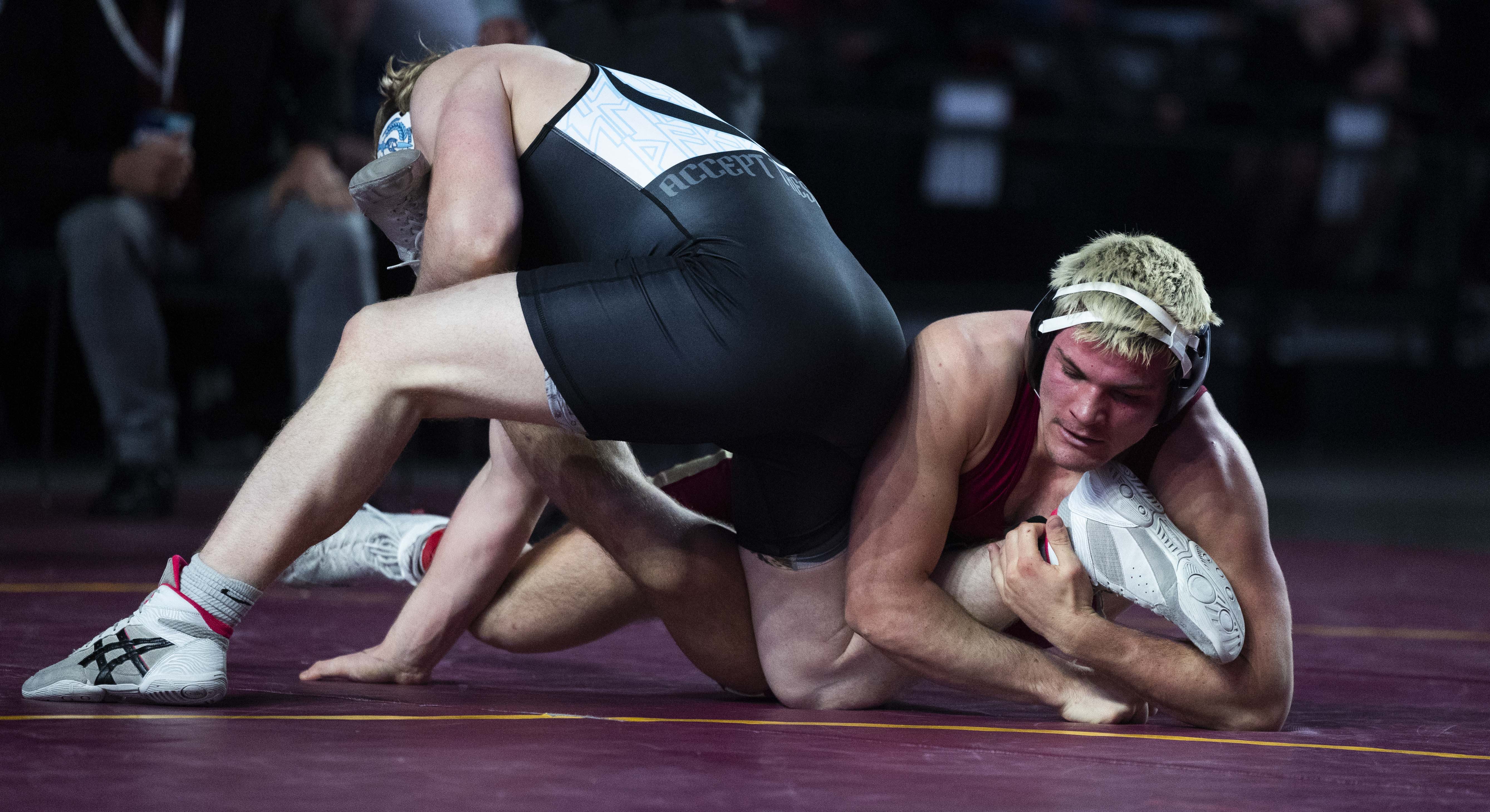 Layton’s Elijah Hawes and Herriman’s Macrae Parker compete against each other in the 190-pound championship in the 6A wrestling state championships at UVU in Orem on Thursday, Feb. 13, 2025.